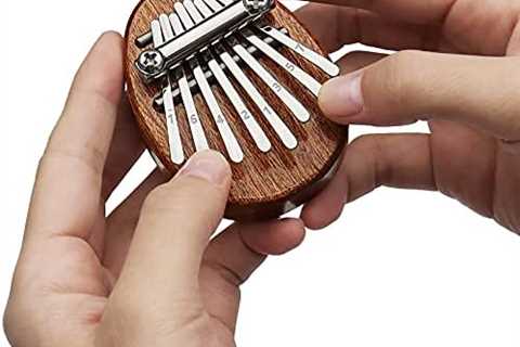 REGIS Kalimba 8 Key exquisite Finger Thumb Piano Marimba Musical good accessory Pendant Gif (Bronze)